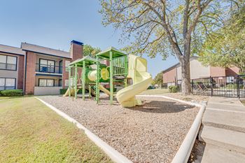 Playground with yellow slide